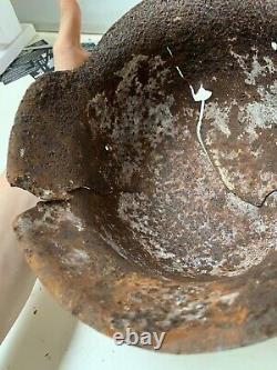 Relic WW2 German Army Helmet Good solid shell Battle Damaged White Washed