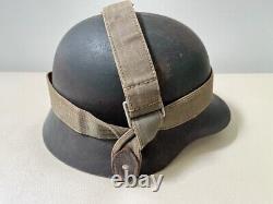 WW2 German Army Combat Helmet M35 Sz 62, Camo Paint withLiner. Orig