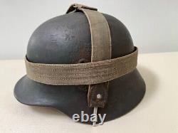 WW2 German Army Combat Helmet M35 Sz 62, Camo Paint withLiner. Orig