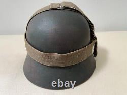 WW2 German Army Combat Helmet M35 Sz 62, Camo Paint withLiner. Orig