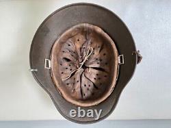 WW2 German Army Combat Helmet M35 Sz 62, Camo Paint withLiner. Orig