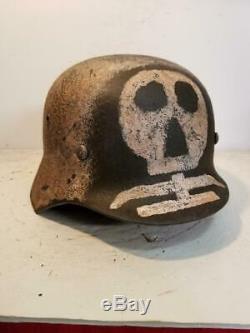 WWII German issued M35 Finnish Army Hand Painted and aged Camo Helmet