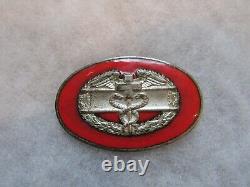 WWII US Army RARE combat medics badge German made pin made into reddish/orange