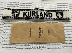 Bande de poignet de vétéran de la Bundeswehr allemande de la Seconde Guerre mondiale 1957 Kurland avec sac