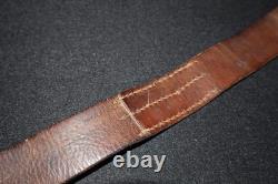 Ceinture en cuir de l’armée impériale allemande de la Première Guerre mondiale, estampillée au bout « 110 », portée sur le terrain, pointe de 41 pouces