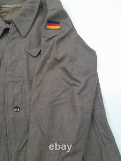 Manteau en laine vintage de l'armée allemande de l'après-guerre et pantalons imperméables G. O. Bucking-Alsfeld