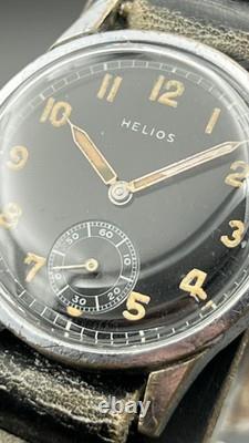 Montre militaire vintage HELIOS DH de l'armée allemande Wehrmacht WWII, révisée, RARE