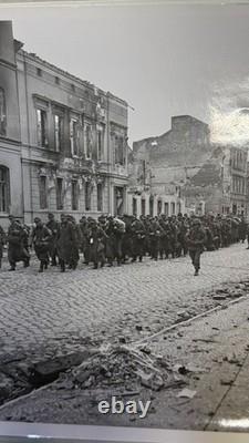 Photo du Corps des transmissions de l'armée américaine de la Seconde Guerre mondiale : prisonniers allemands, Zerbst, Allemagne, 63e division d'infanterie