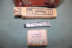 Trousse de premiers secours médicale allemande datée de 1940 avec contenu, bandage de plaie de l'armée